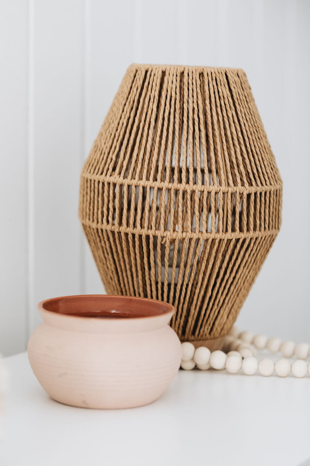 Rattan lamp and ceramic bowl