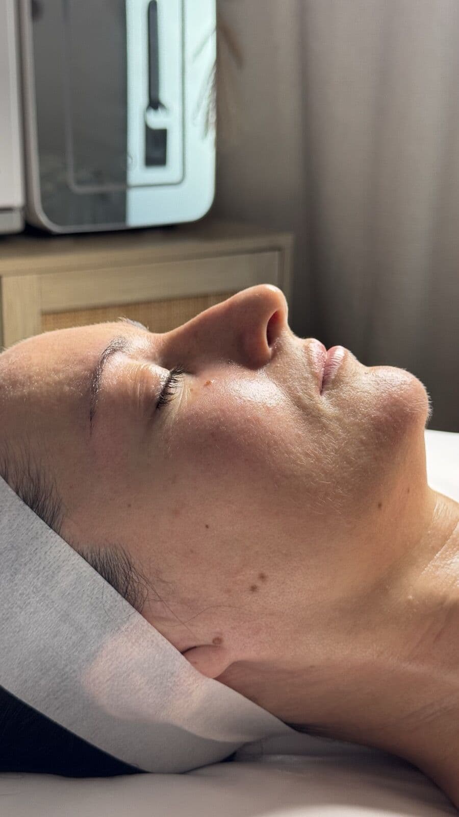Guest relaxing during a facial